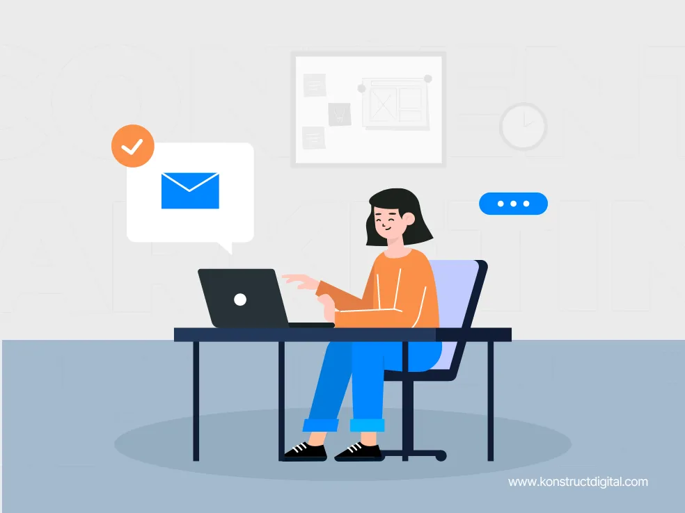 A woman reading an email on her laptop.