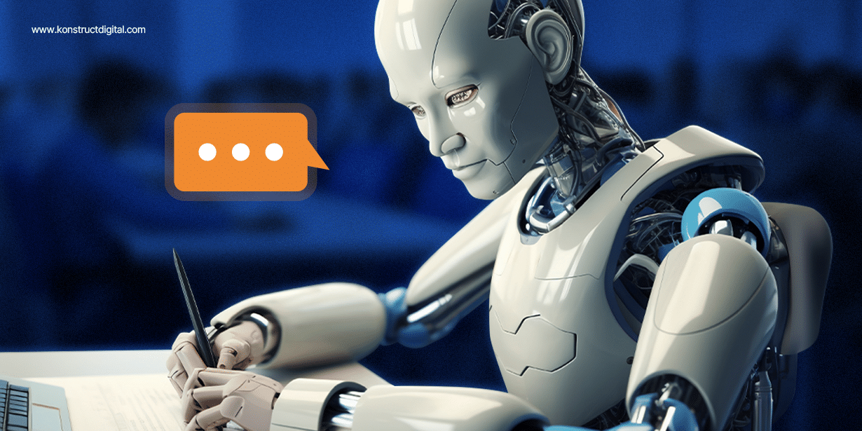 A humanoid robot with a futuristic design is sitting at a desk, writing on paper with a pen. A speech bubble with three dots hovers near the robot's head, suggesting it is engaged in communication.
