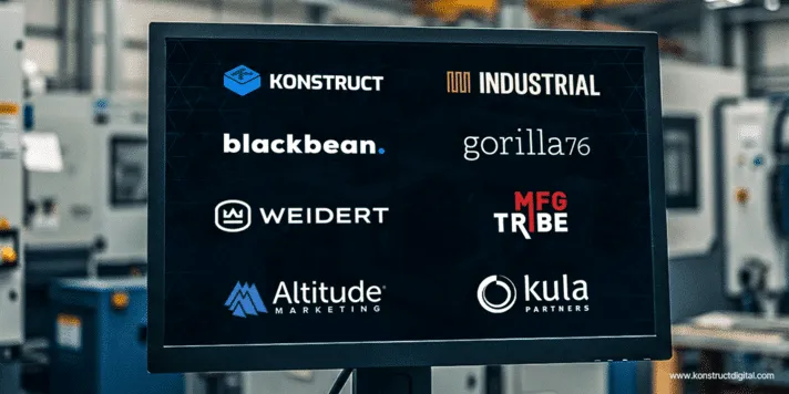 Computer monitor displaying logos of top industrial marketing agencies, including Konstruct, Industrial, blackbean, gorilla76, Weidert, MFG Tribe, Altitude Marketing, and Kula Partners, set in a manufacturing facility background.