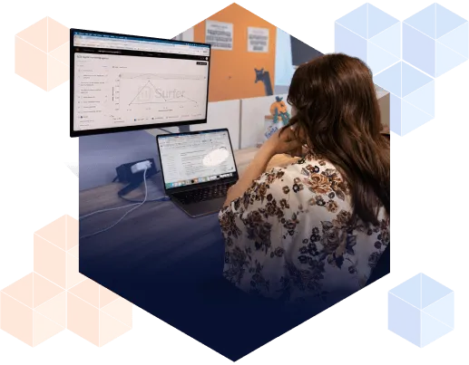 A person reviewing SEO content on a laptop screen, representing content written for both the buyer and the search algorithm.