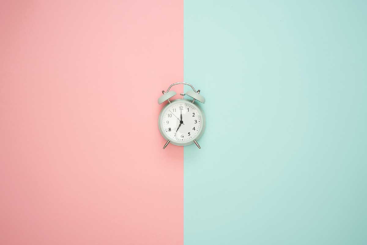 A Clock on a Multi-Colour Background
