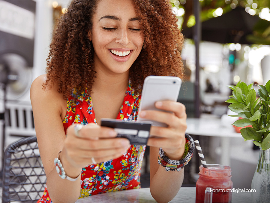 Woman online shopping on her smartphone