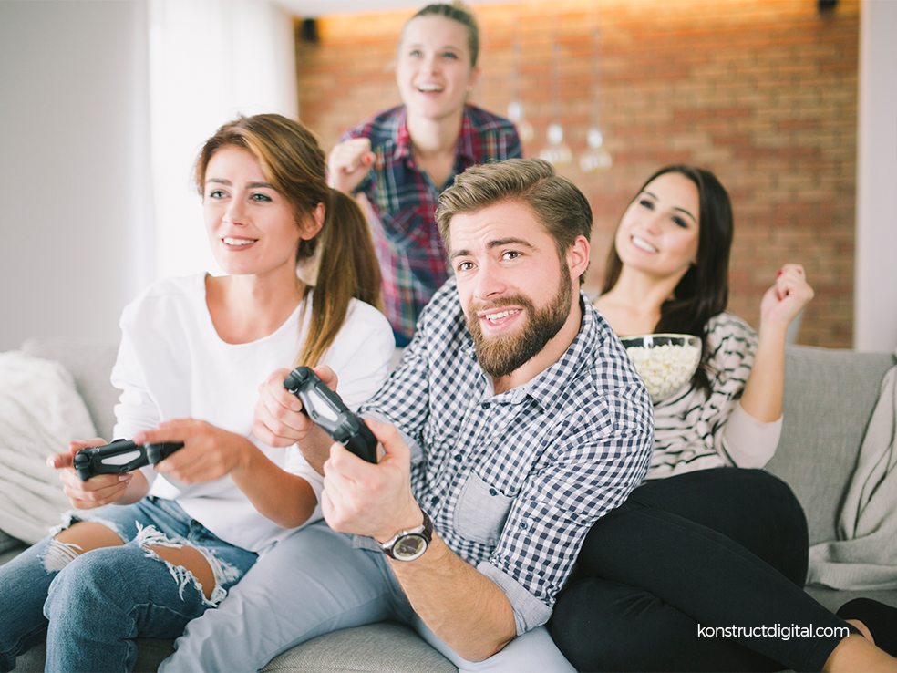 A group of friends playing video games.