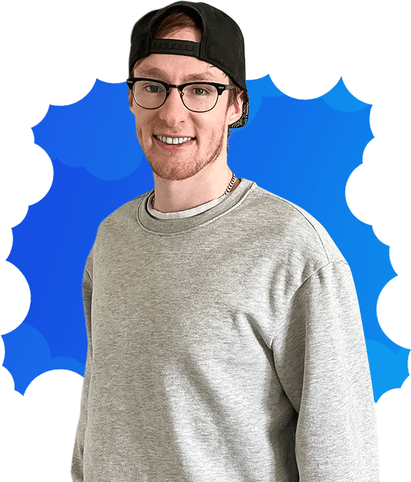 Brady Bateman smiling wearing his sweater