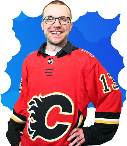 Joel Messner smiling with a flames jersey
