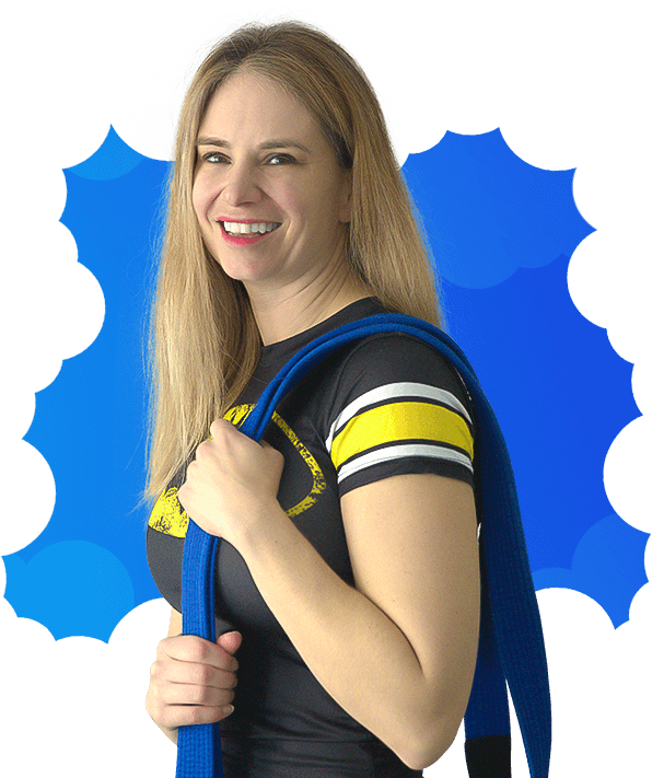 Kim Findlay posing with her Jiu-Jitsu blue belt