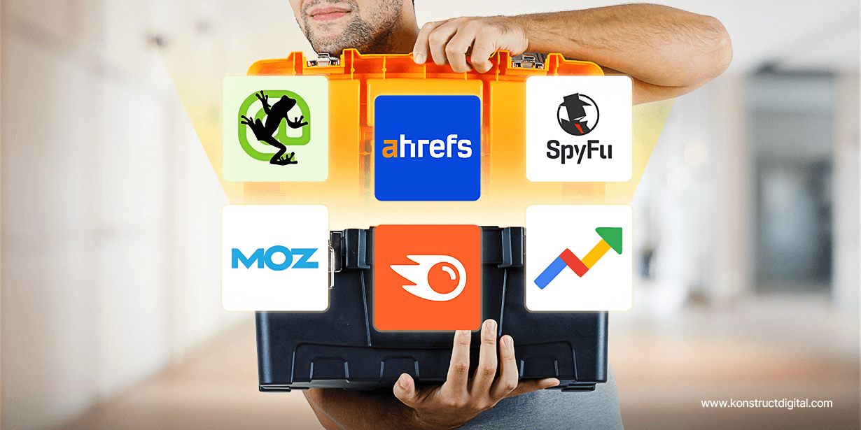 A man holding a tool box open with the SpyFu, ahrefs, moz keyword explorer, and Google search console logos.