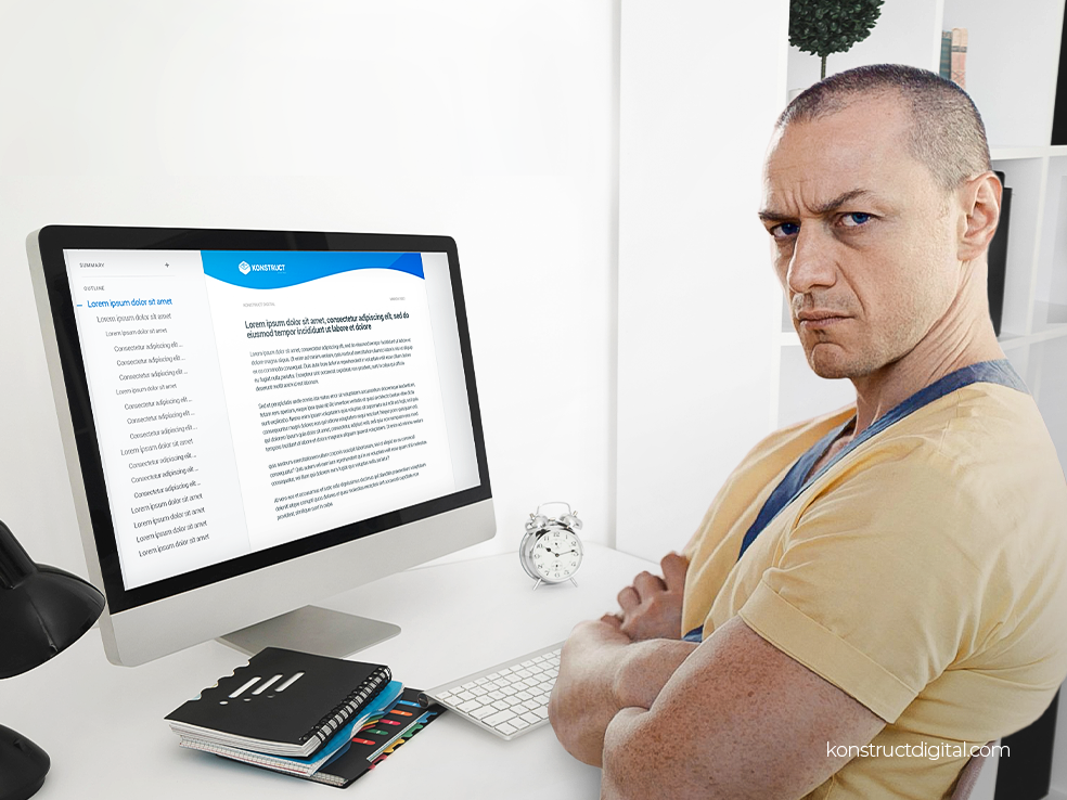 Kevin Wendell, the main character from Split, sitting in front of a computer.